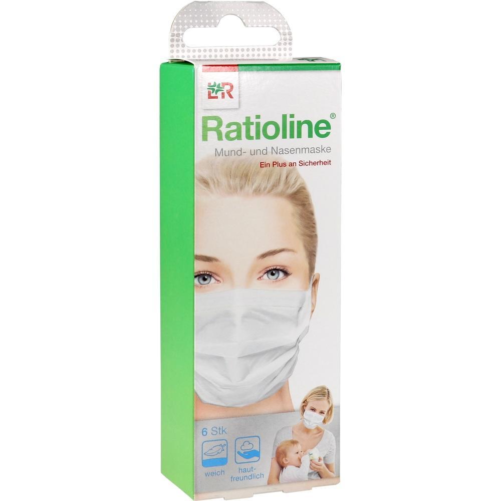 Verpackung mit Mund- und Nasenmasken, grün-weißes Design.
